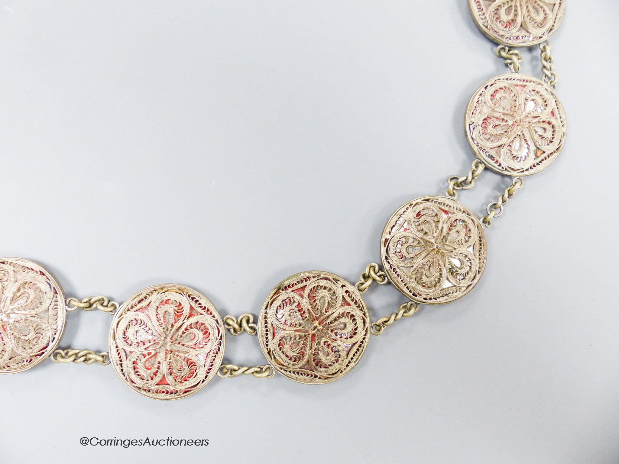 A Russian white metal and filigree belt, length 68cm